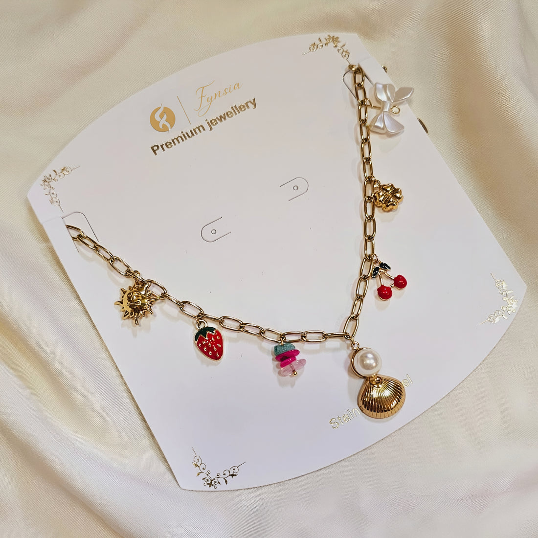 Kiara Ocean Charm Neckchain – 18K Gold Tone Stainless Steel | Fynsia