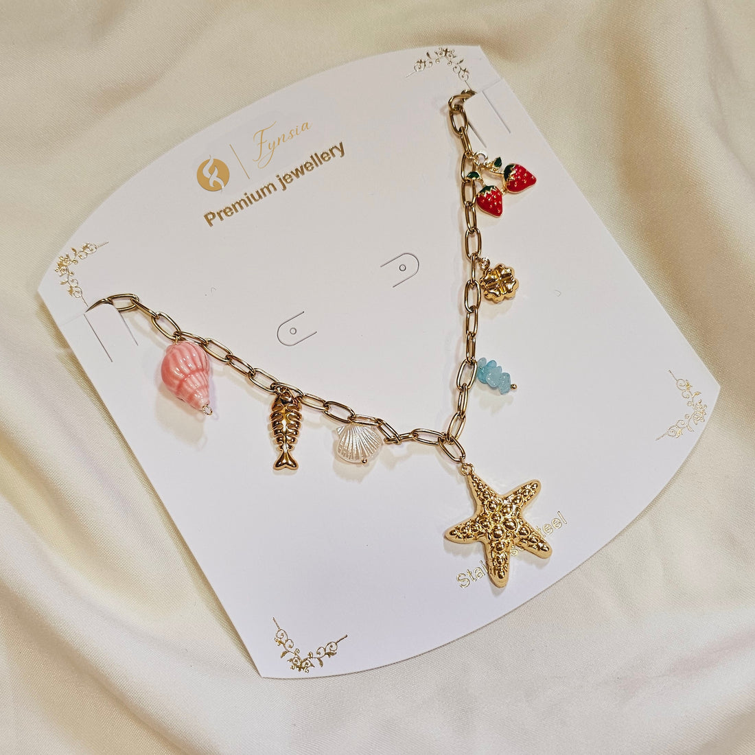 Naira Seashell Charm Neckchain – 18K Gold Tone Stainless Steel | Fynsia