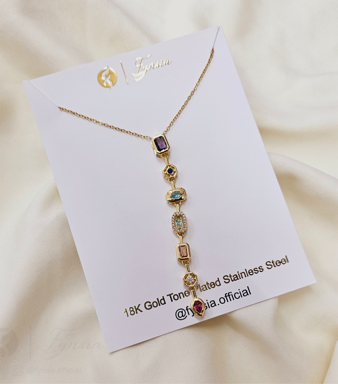 Riro Long Solitaire Neckchain – 18K Gold Tone Stainless Steel | Fynsia