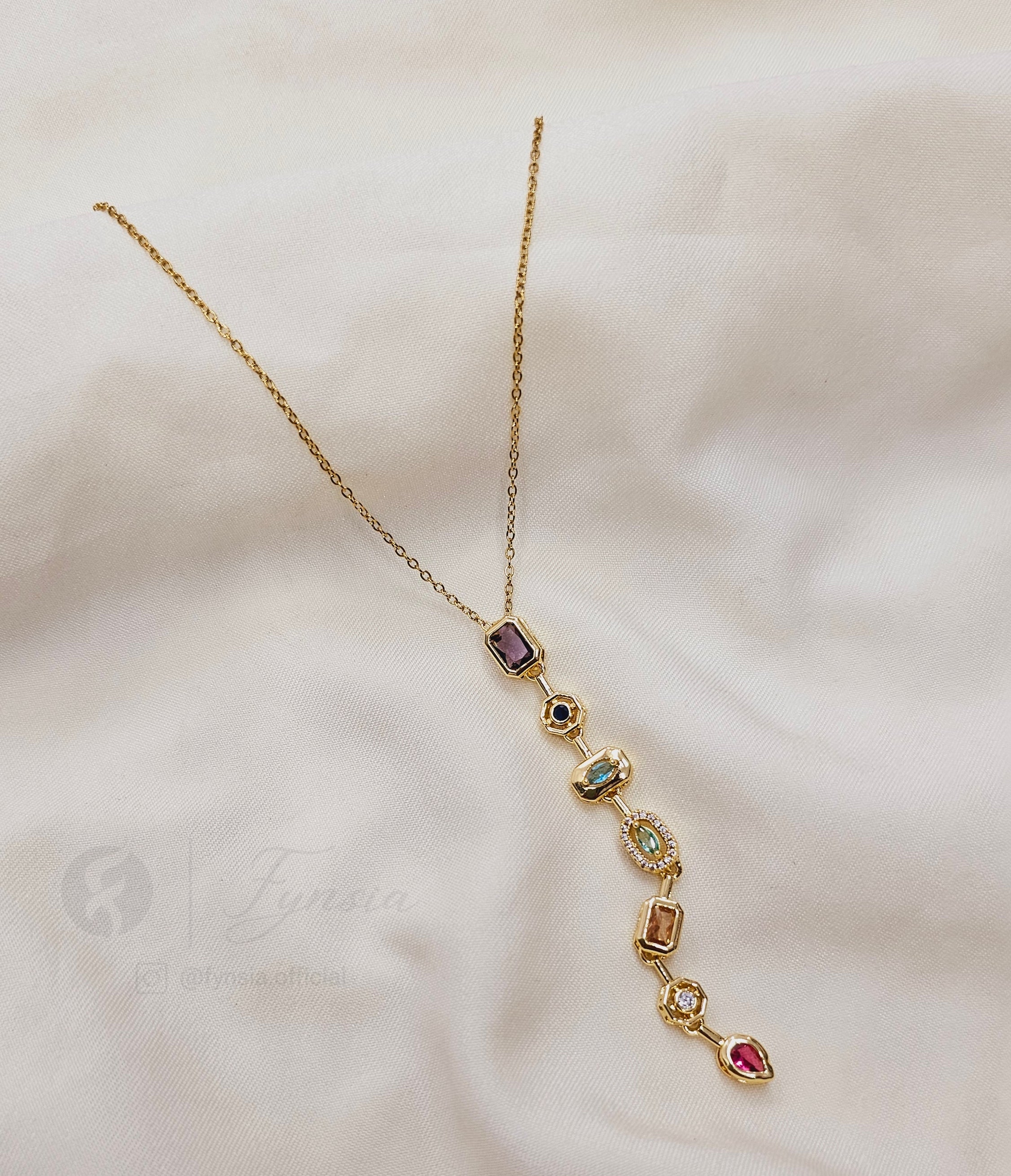 Riro Long Solitaire Neckchain – 18K Gold Tone Stainless Steel | Fynsia