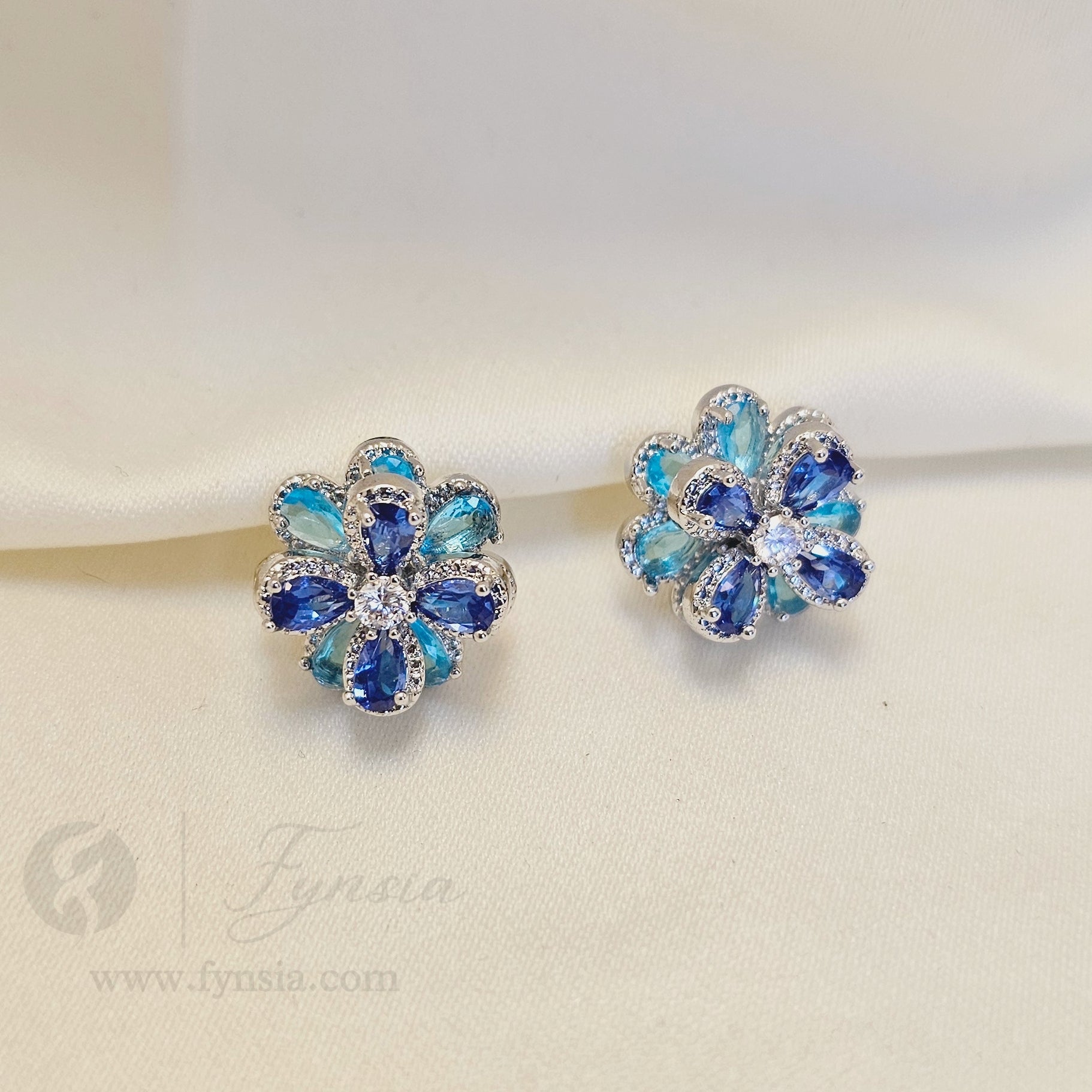 Tushita Zirconia Aqua Blue Silver Tone Pendant Chain Set With Earrings | Fynsia