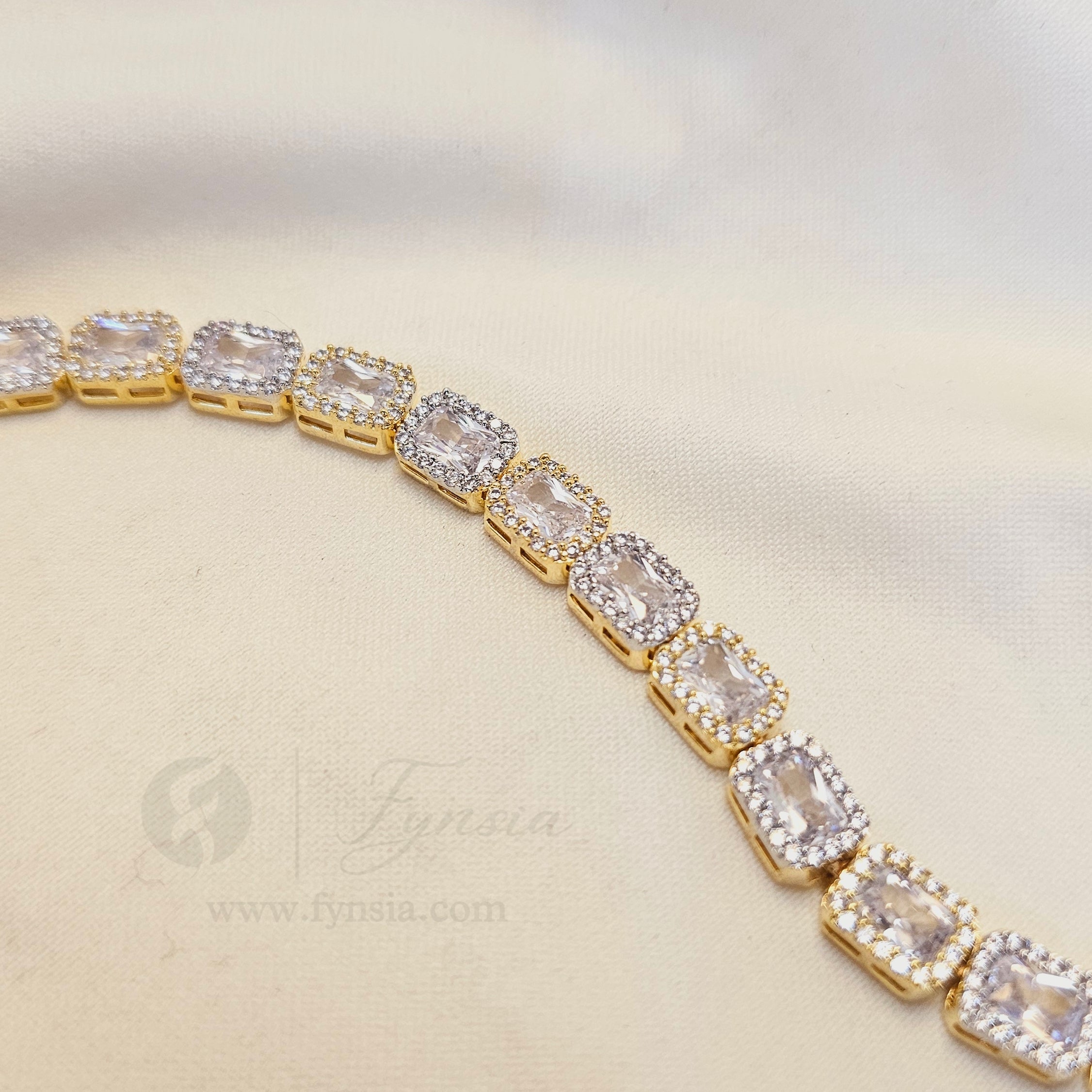Kene Golden American Diamond Tennis Bracelet - | Fynsia