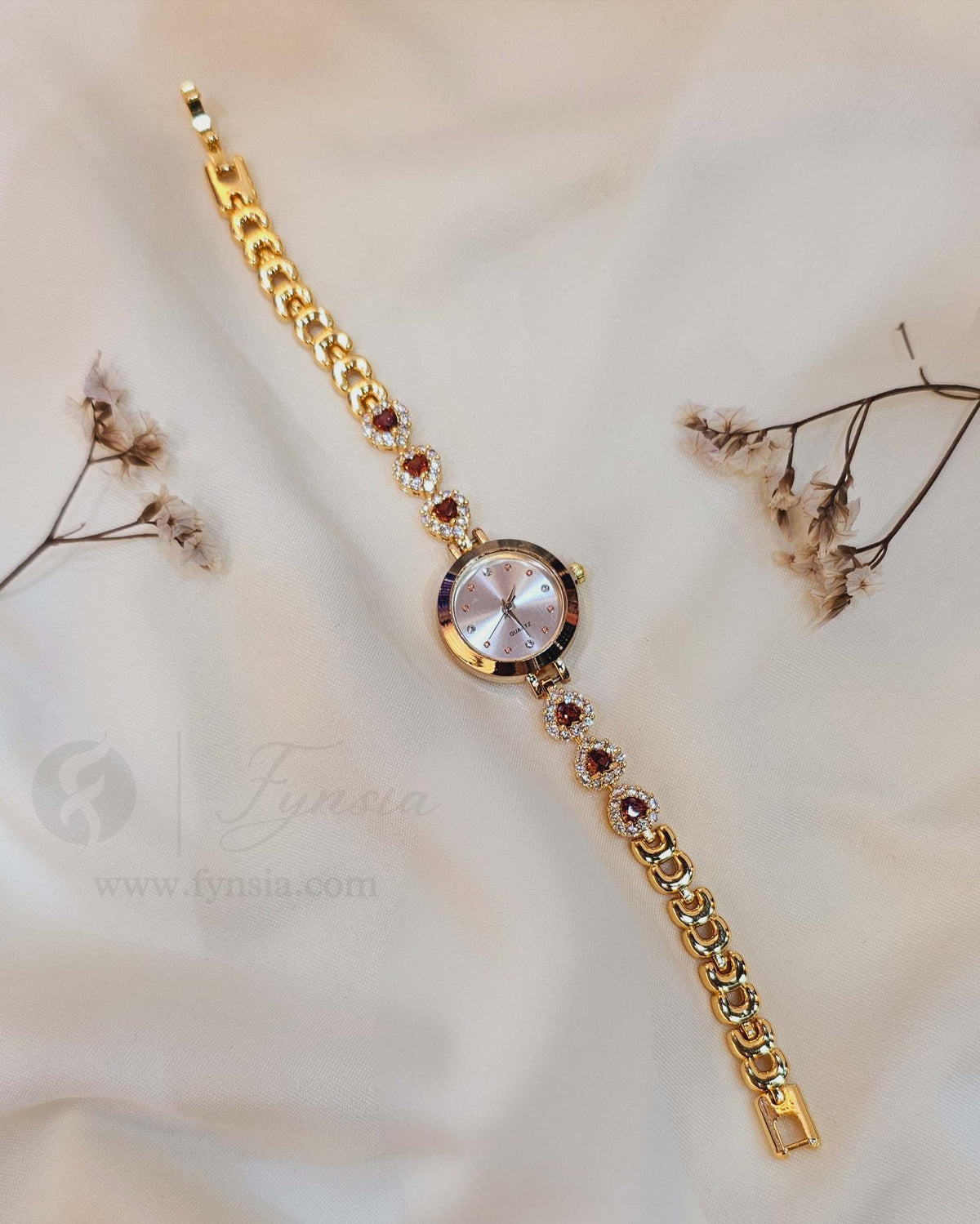 Diksha Golden White Round Dial Zirconia Red Stone Belt Women's Watch | Fynsia