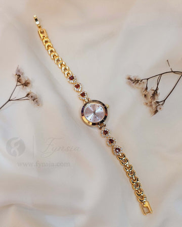 Diksha Golden White Round Dial Zirconia Red Stone Belt Women's Watch | Fynsia