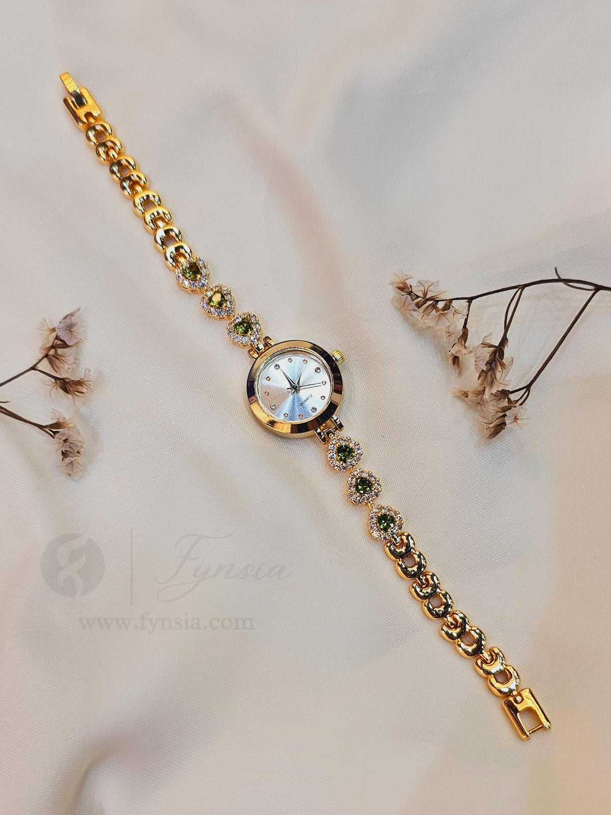 Rasleen Golden White Round Dial Zirconia Green Stone Belt Women's Watch | Fynsia