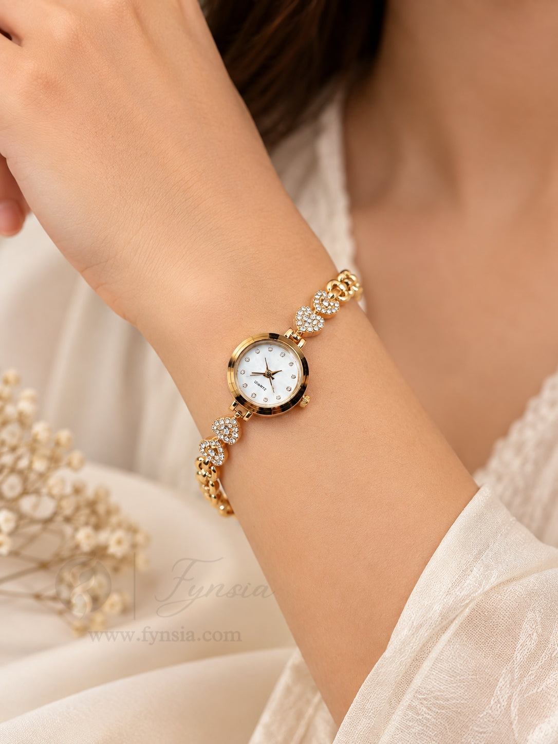 Aparna Golden White Round Dial Zirconia Pink Stone Belt Women's Watch | Fynsia