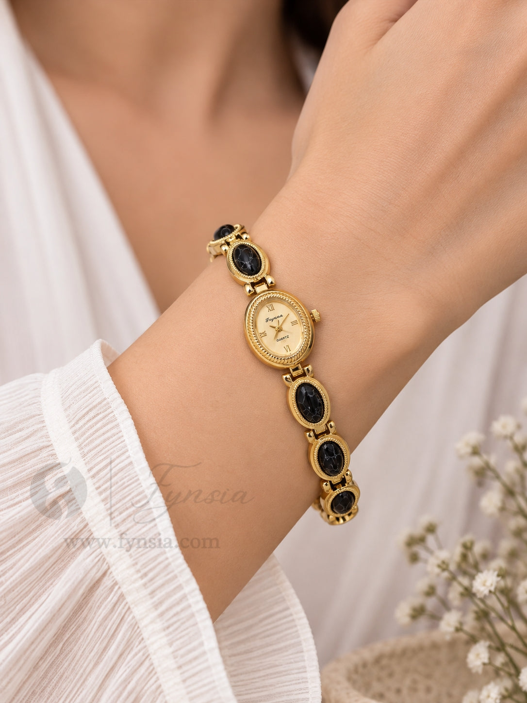 Zakira Golden White Round Dial Metal Black Bead Belt Women's Watch | Fynsia