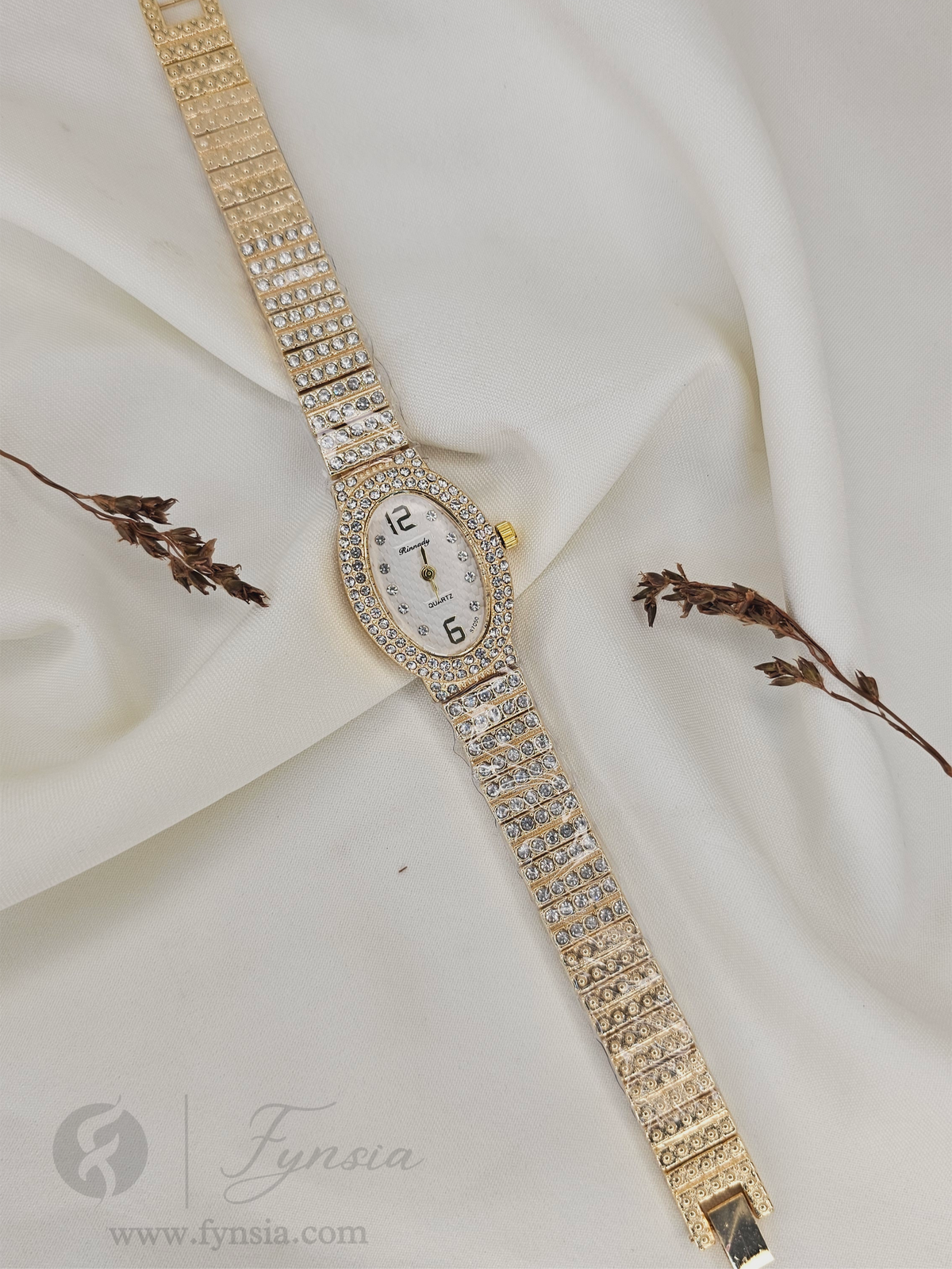 Ruby Diamond Golden White Oval Dial Metal Belt Women's Watch | Fynsia